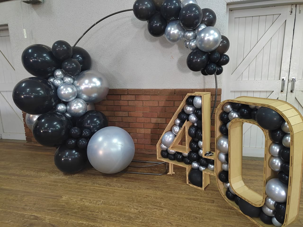 Black and silver balloon garland with a giant 40 number